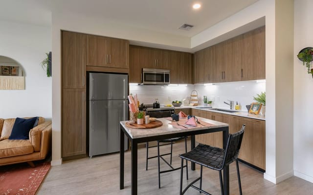 Modern kitchen interior with dining area