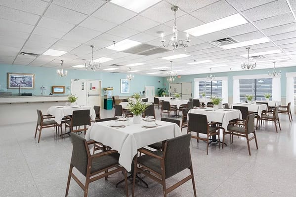 Bright dining room with elegantly dressed tables