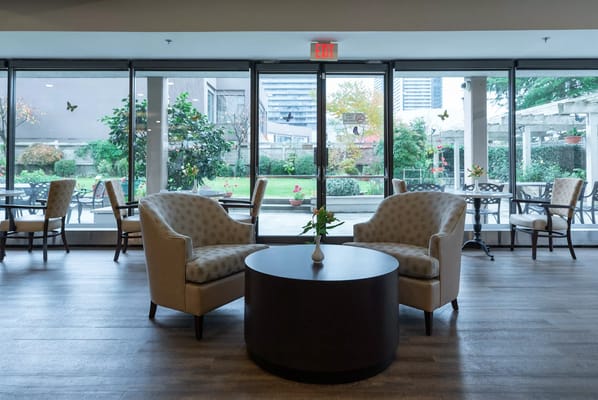 Indoor seating area with view of garden