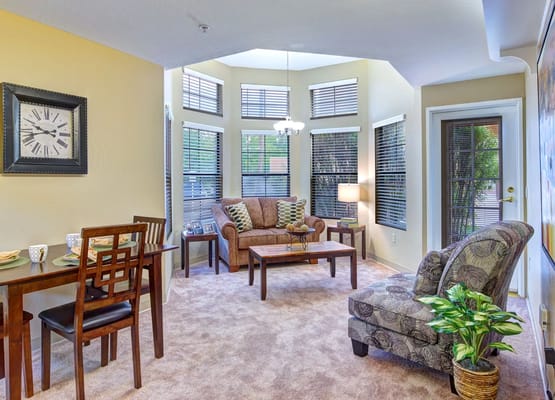 Bright living room with comfortable seating and dining area