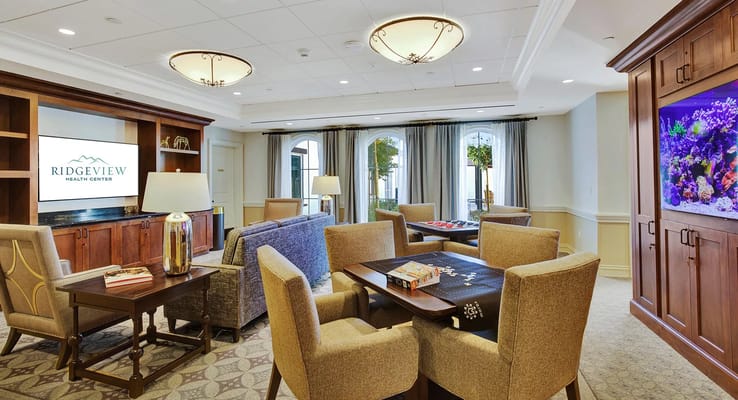 Common area with seating and decorative aquarium