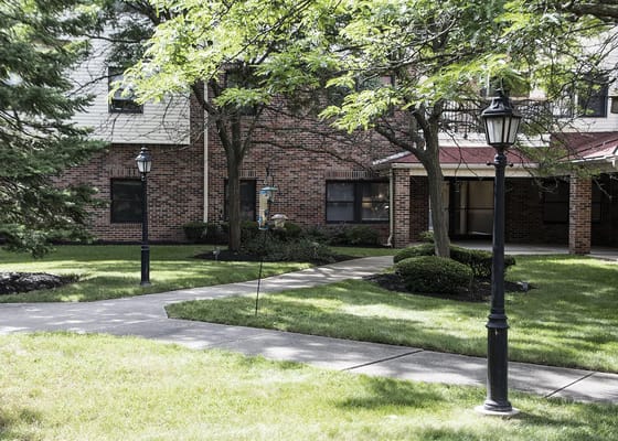 Pathway in a landscaped outdoor area of the facility