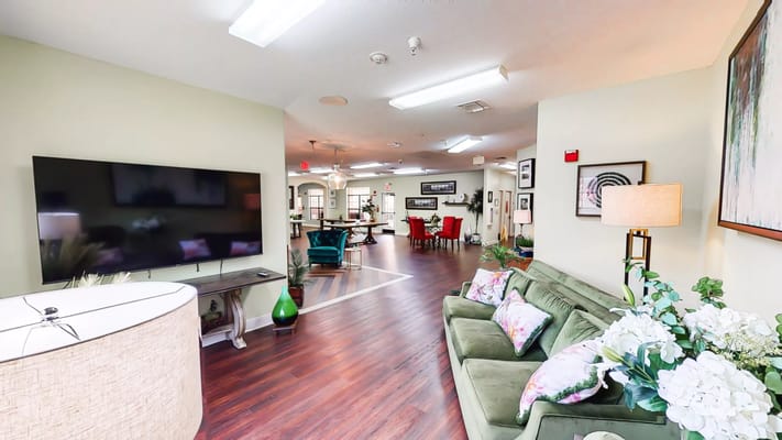 Bright interior common area with seating and decor