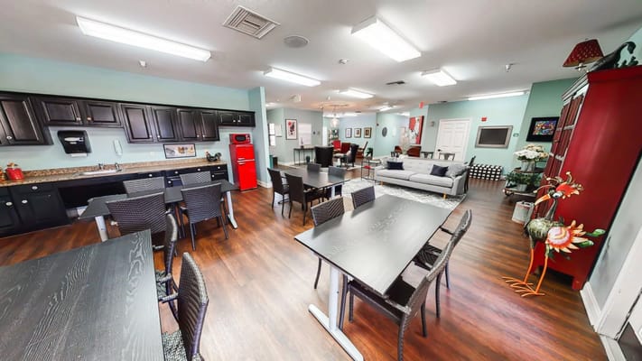 Interior common area with dining tables and seating