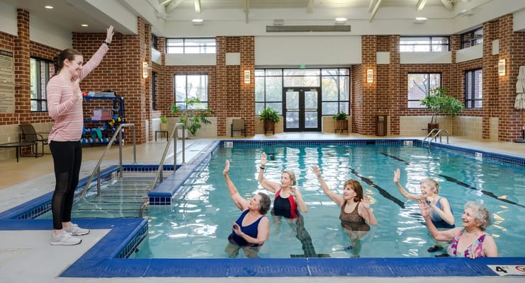 Residents participating in an aquatic exercise class