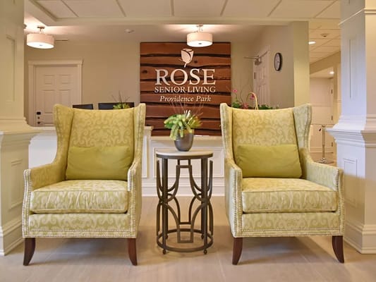 Cozy seating area in a senior living facility lobby
