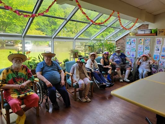 Residents enjoying an activity together in a bright room