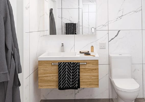 Stylish bathroom with wooden vanity and marble tiles