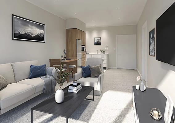 Stylish living room with seating area and kitchenette