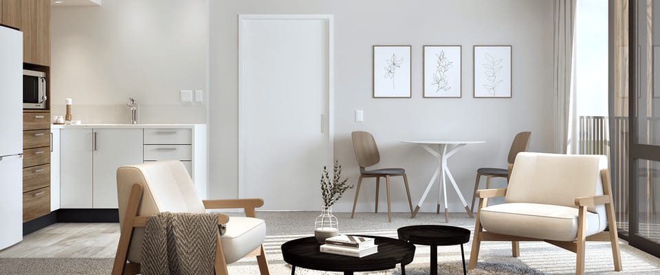 Bright and modern living room with kitchen area and dining table