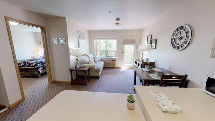 Bright living area in a resident unit with a view