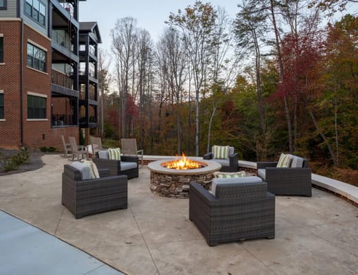 Fire pit surrounded by seating at Salemtowne Retirement Community