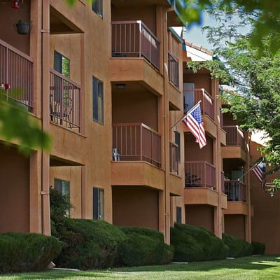 Exterior view of a senior living facility with balconies