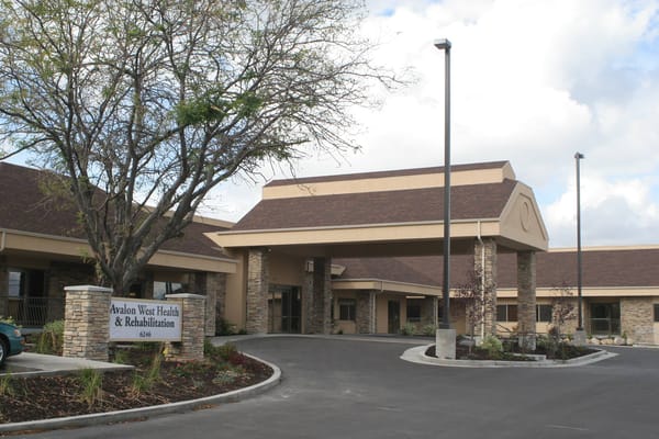 Entrance of Sandstone Taylorsville senior living facility