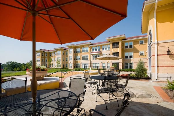 Outdoor seating area with umbrellas at the facility