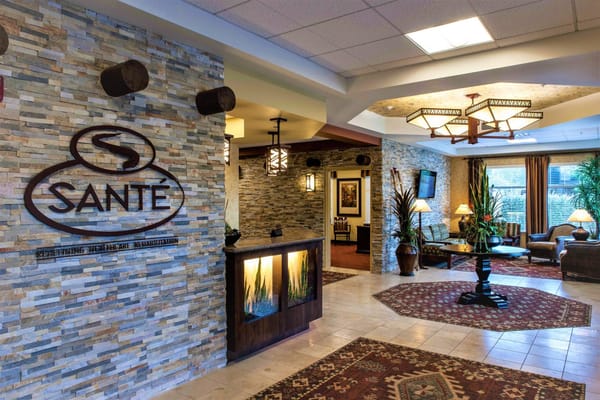 Luxurious lobby area of Santé of Scottsdale with decorative stone wall and seating