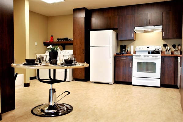Well-equipped kitchen with dining table and decor