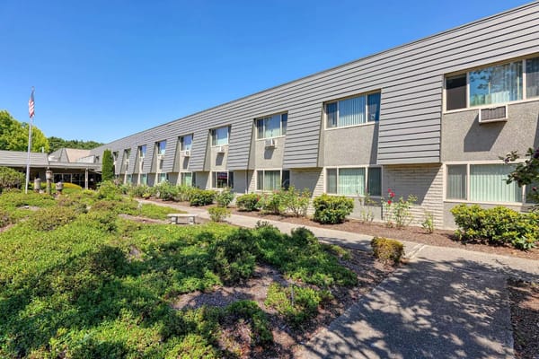 Front view of Sapphire at Applewood with landscaped garden