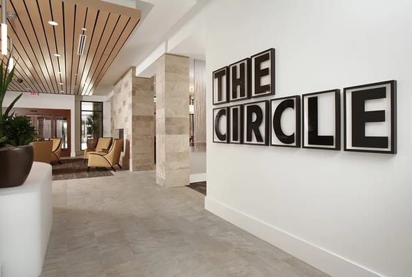Interior view of The Circle with decorative signage and seating