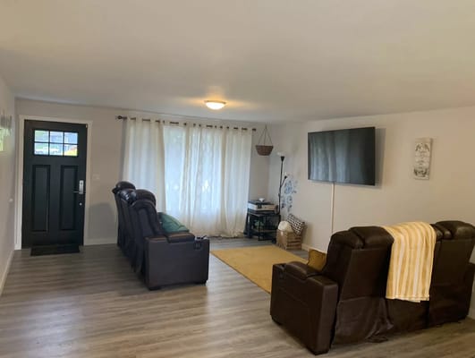 Cozy common area with seating and natural light