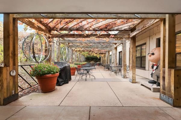 Patio area with tables and potted plants