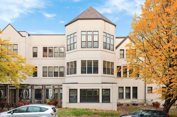 Exterior view of St Anthony Park Home building surrounded by trees