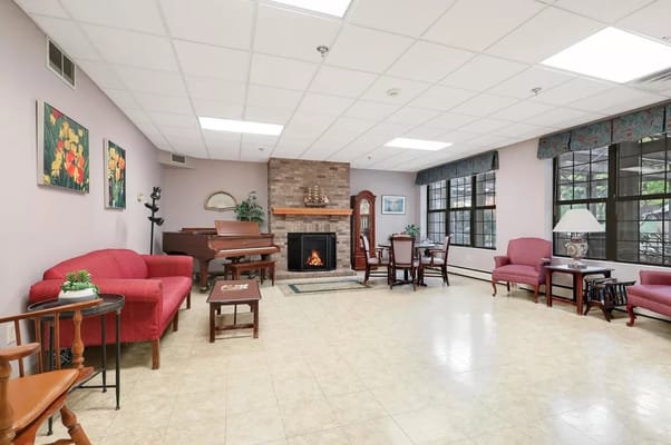 Interior lounge area with seating and piano