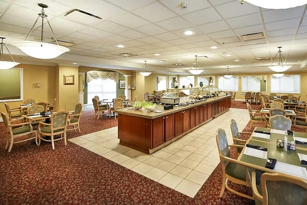 Dining area with tables and a buffet setup