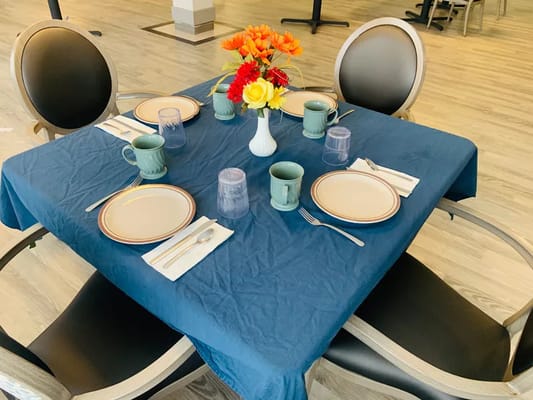 Dining room table set for a meal