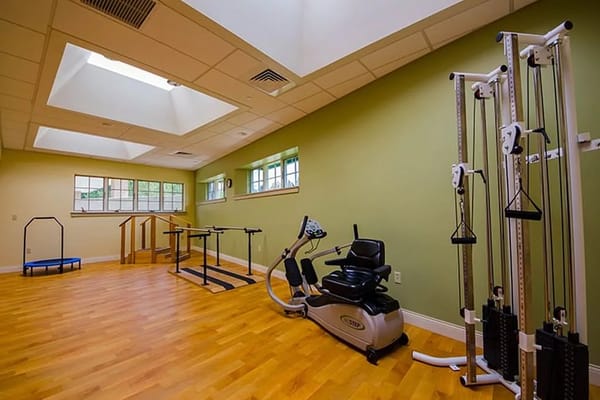 Interior view of an exercise area with fitness equipment