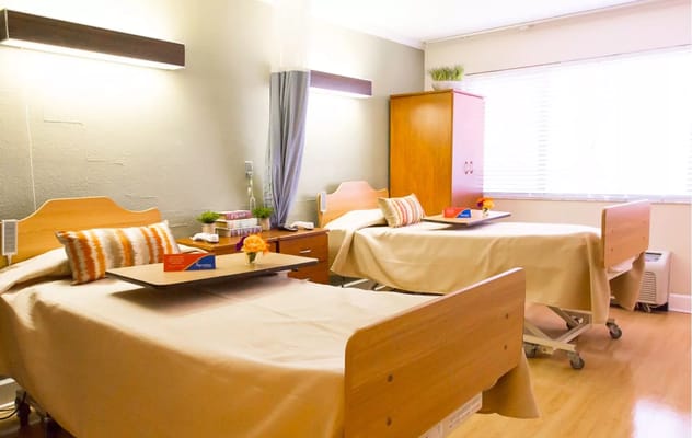 Bright, shared resident room with two beds