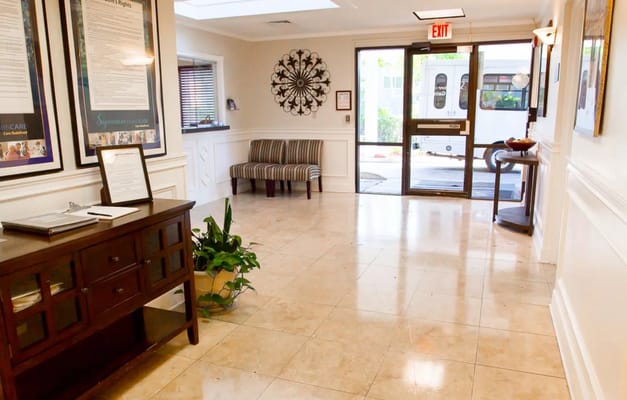 Bright lobby area with seating and decor