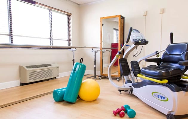 Interior view of a fitness area with exercise equipment