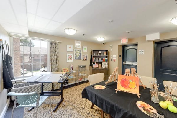 Activity room with art supplies and tables