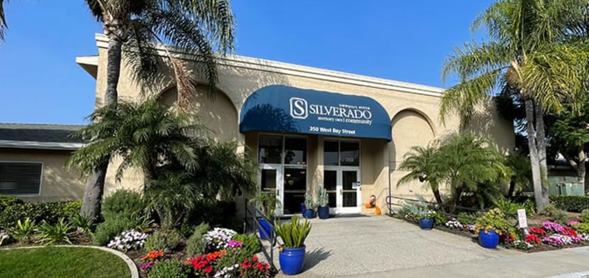 Front entrance of Silverado Newport Mesa with landscaping