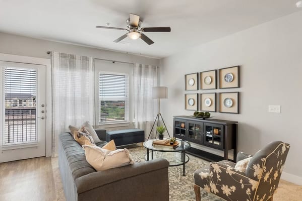 Cozy living room with large windows and modern decor