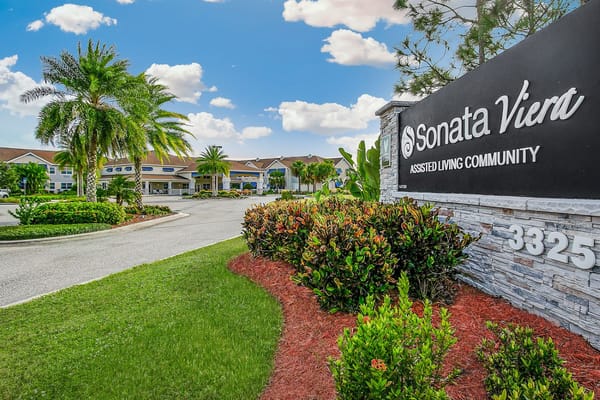 The entrance sign of Sonata Viera with landscaped grounds.