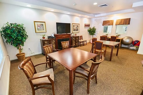 Interior view of the common area with tables and chairs