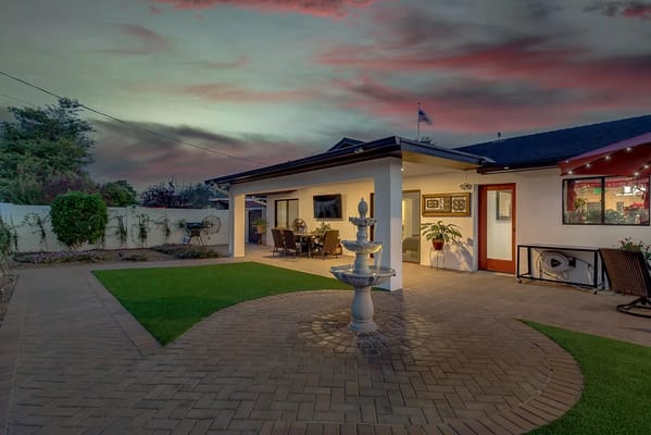 Outdoor area with a fountain and seating