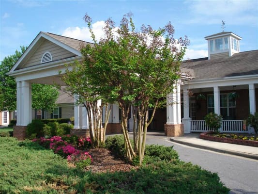 View of the entrance with landscaping at Springs of Catawba