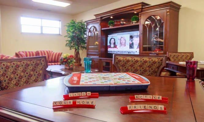 Table with games and decor in the common area