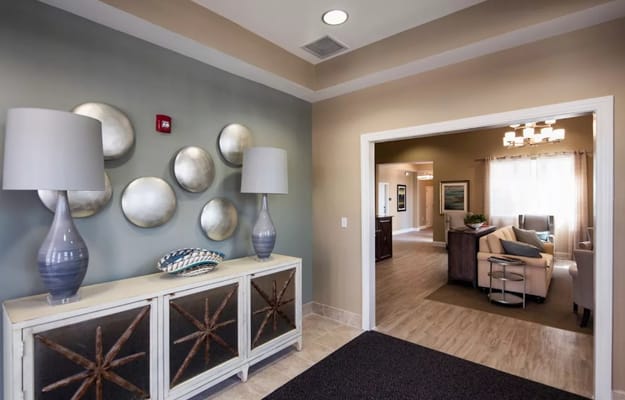 Light-filled lobby with modern decor and seating area