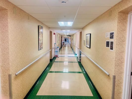 A brightly lit corridor in the facility