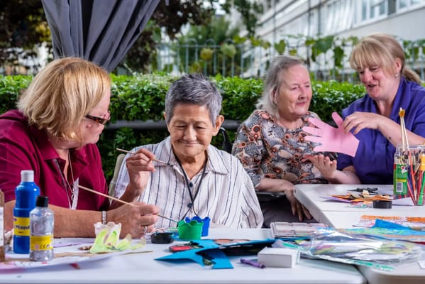 Residents engaged in a creative activity outdoor