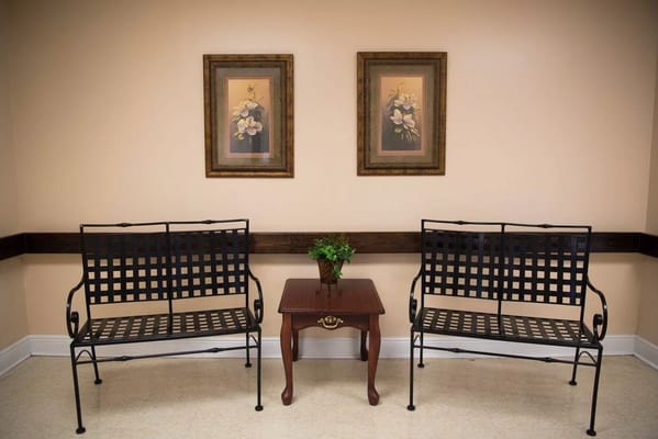 Interior space with benches and wall decor