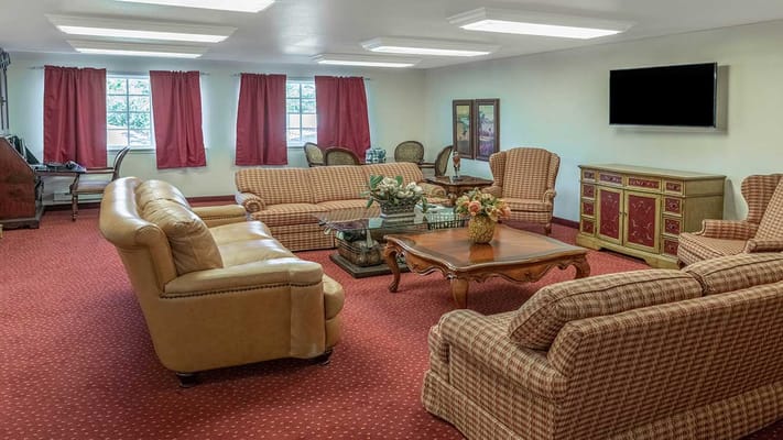 Bright common area with seating and decor