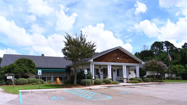 Front view of Stoneybrook Memory Care Home showing the entrance and parking area.