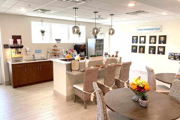 Bright common area with snacks and seating