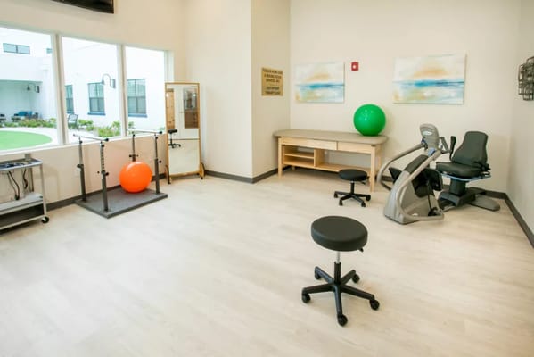 Well-equipped exercise room with fitness equipment