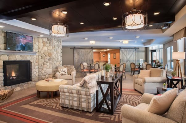 Common area lounge with seating and fireplace